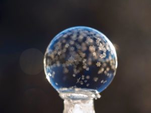 Tiny frozen bubble snowflakes