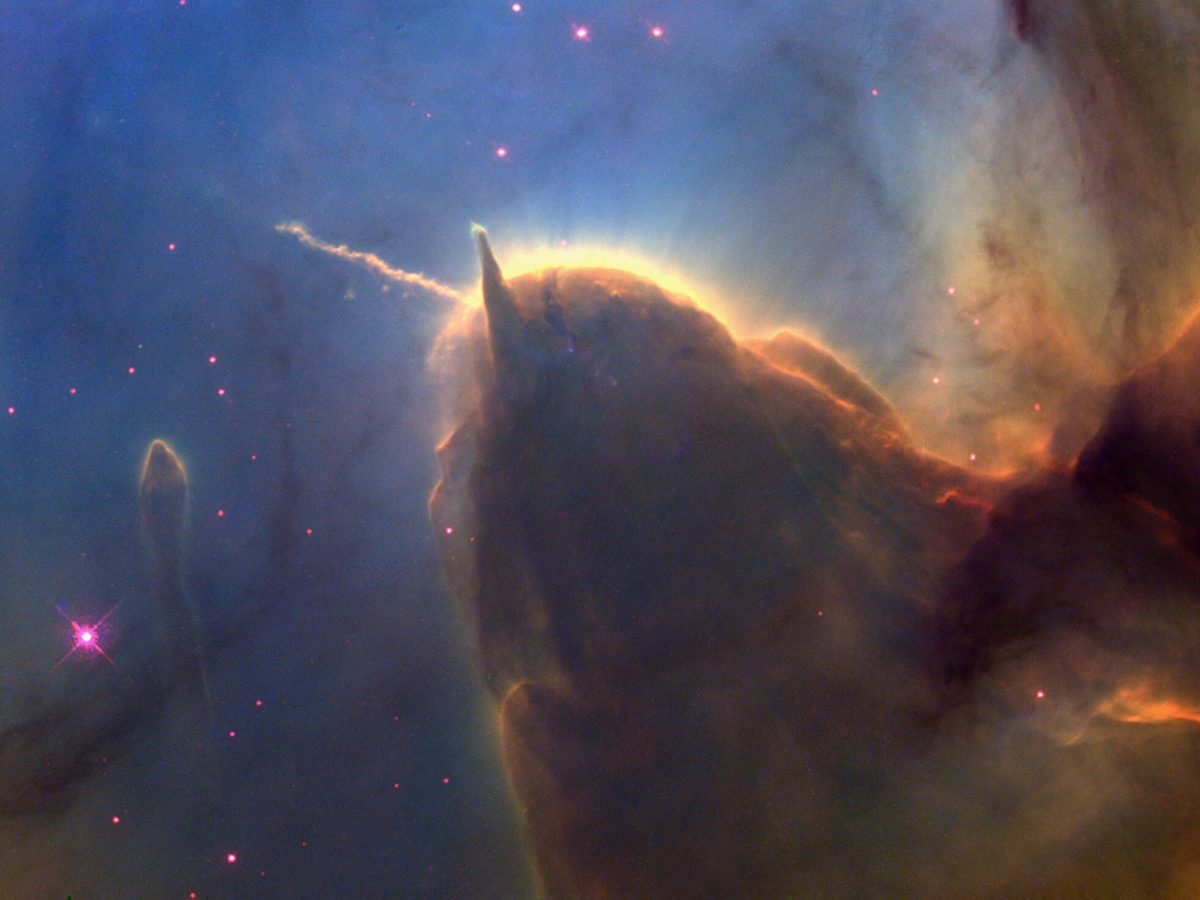 THIS NASA HUBBLE SPACE TELESCOPE IMAGE OF THE TRIFID NEBULA REVEALS A STELLAR NURSERY BEING TORN APART BY RADIATION FROM A NEARBY MASSIVE STAR. "TRIFID NEBULA; STELLAR SIBLING RIVALRY".